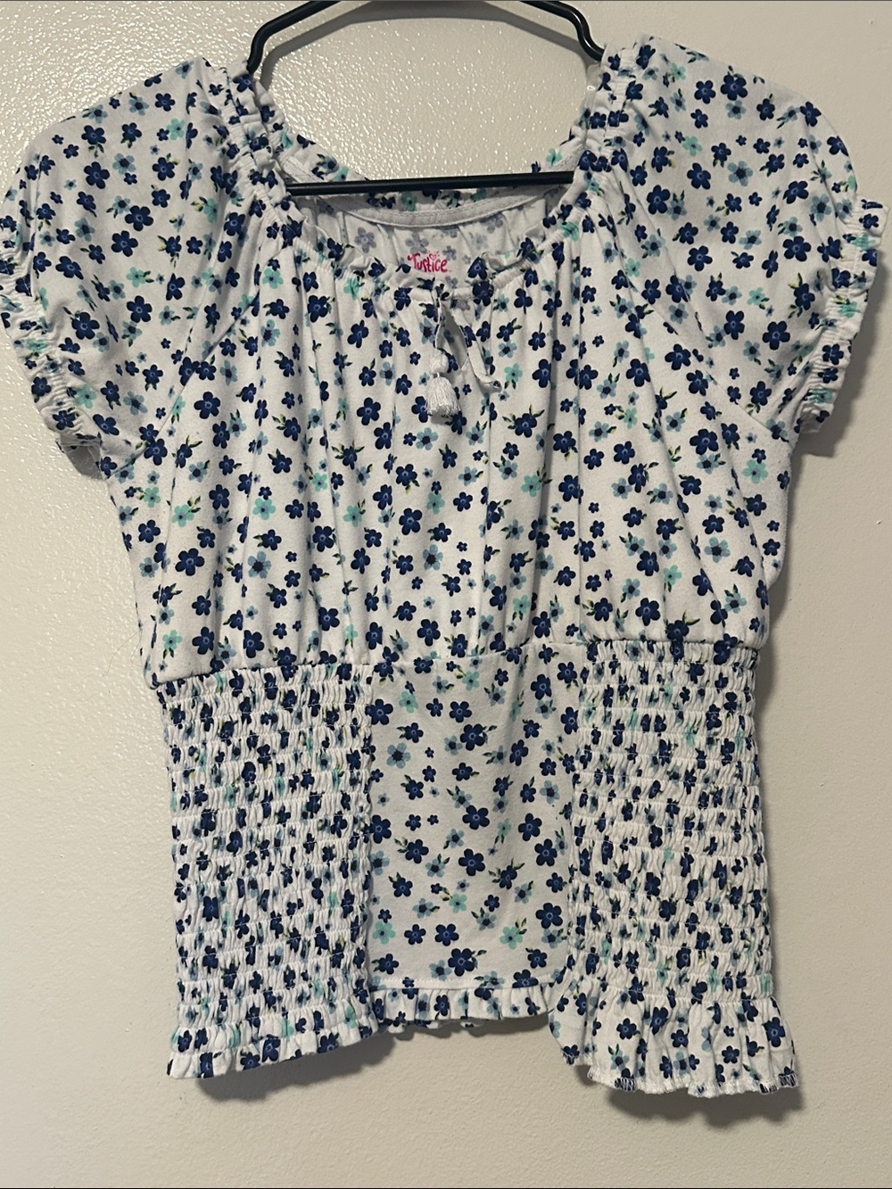 Justice White Floral Smocked Peplum Top with Navy and Teal Flowers